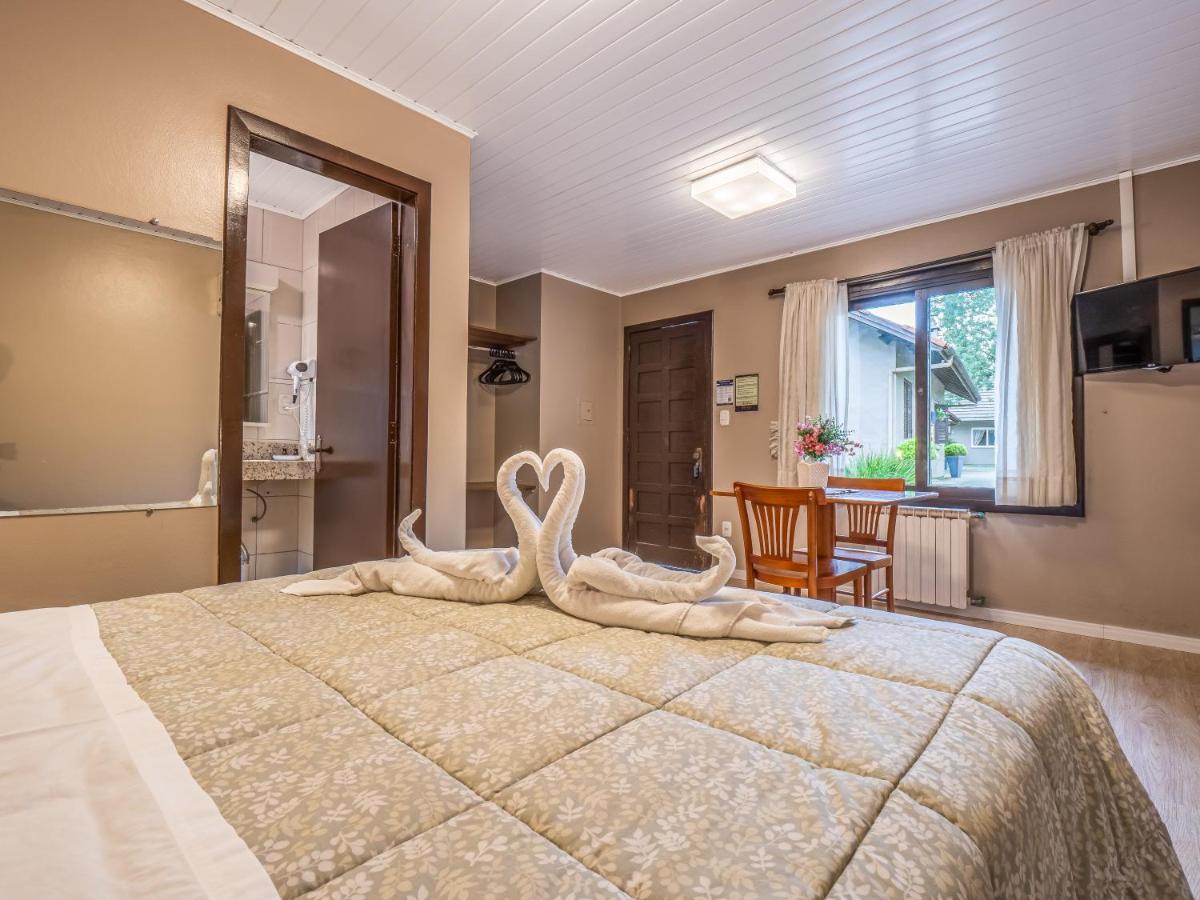 Hotel Fioreze Quero Quero Грамаду Номер фото